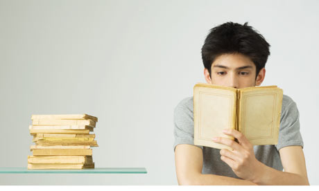 Young-man-reading-a-book-001.jpg